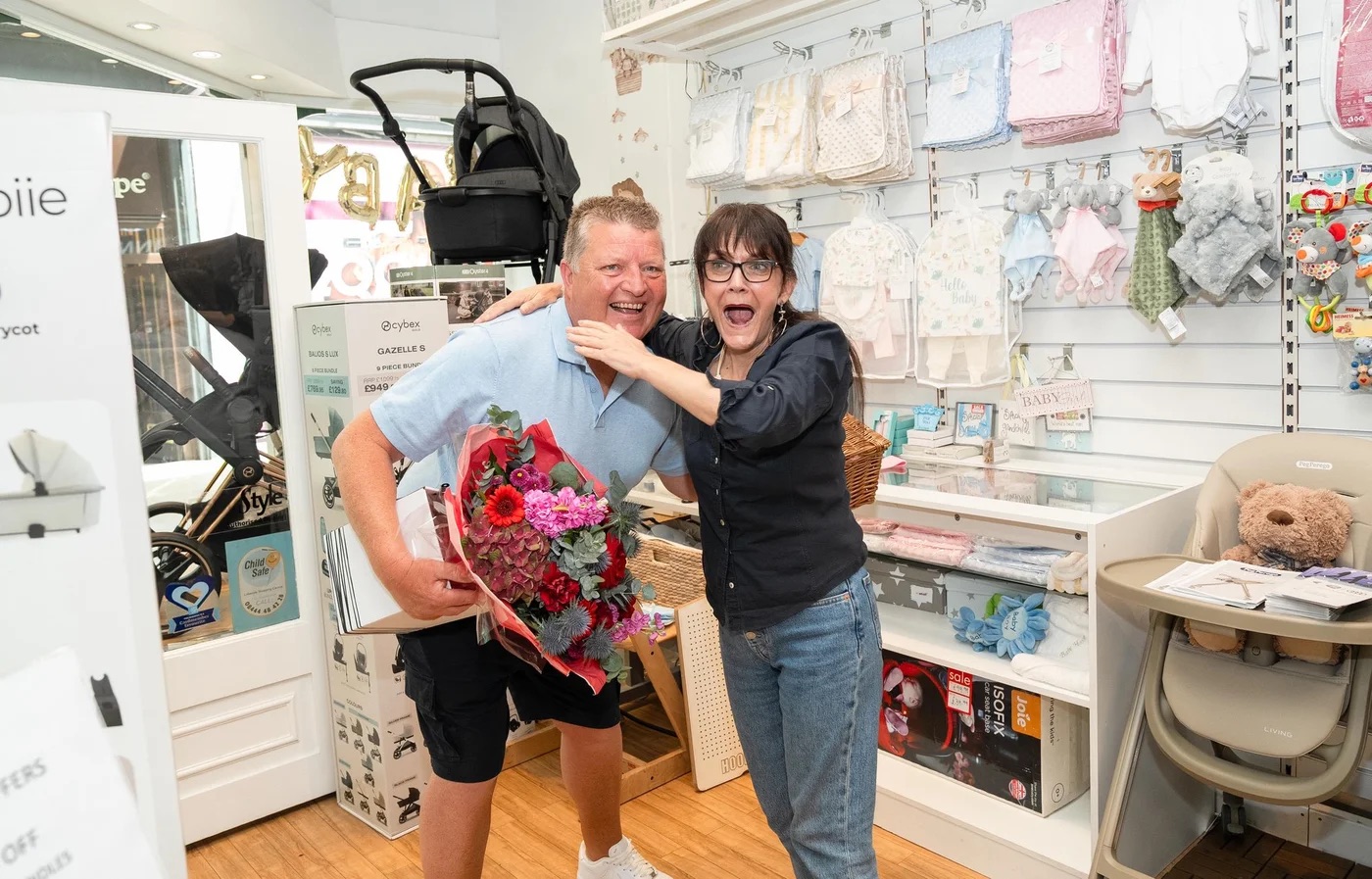 15621_mr-macdonald-surprised-his-former-colleagues-pictured-donna-samuels-with-gifts-after-his-win.jpg